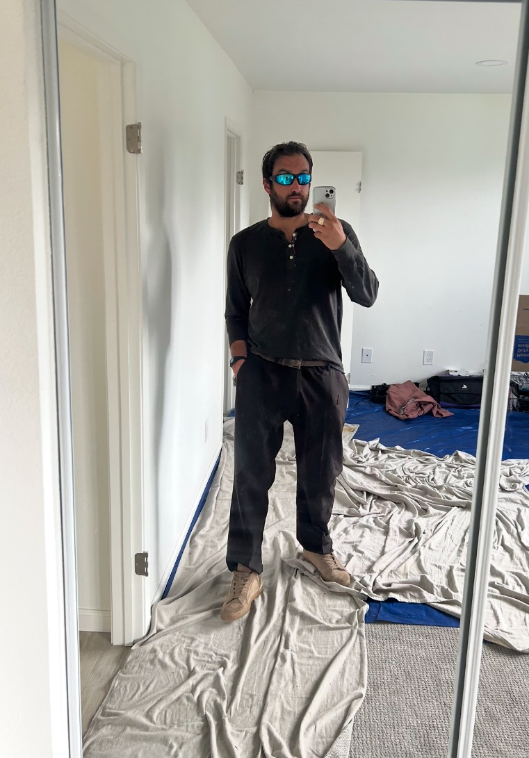DenimVue — Neptune Field — Job Site, blue polo, Nikes, tarp