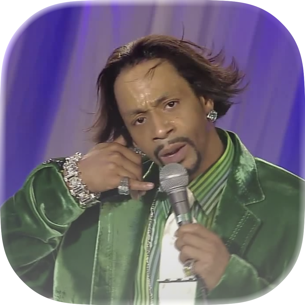 green velvet, mic in hand, on the purple curtain