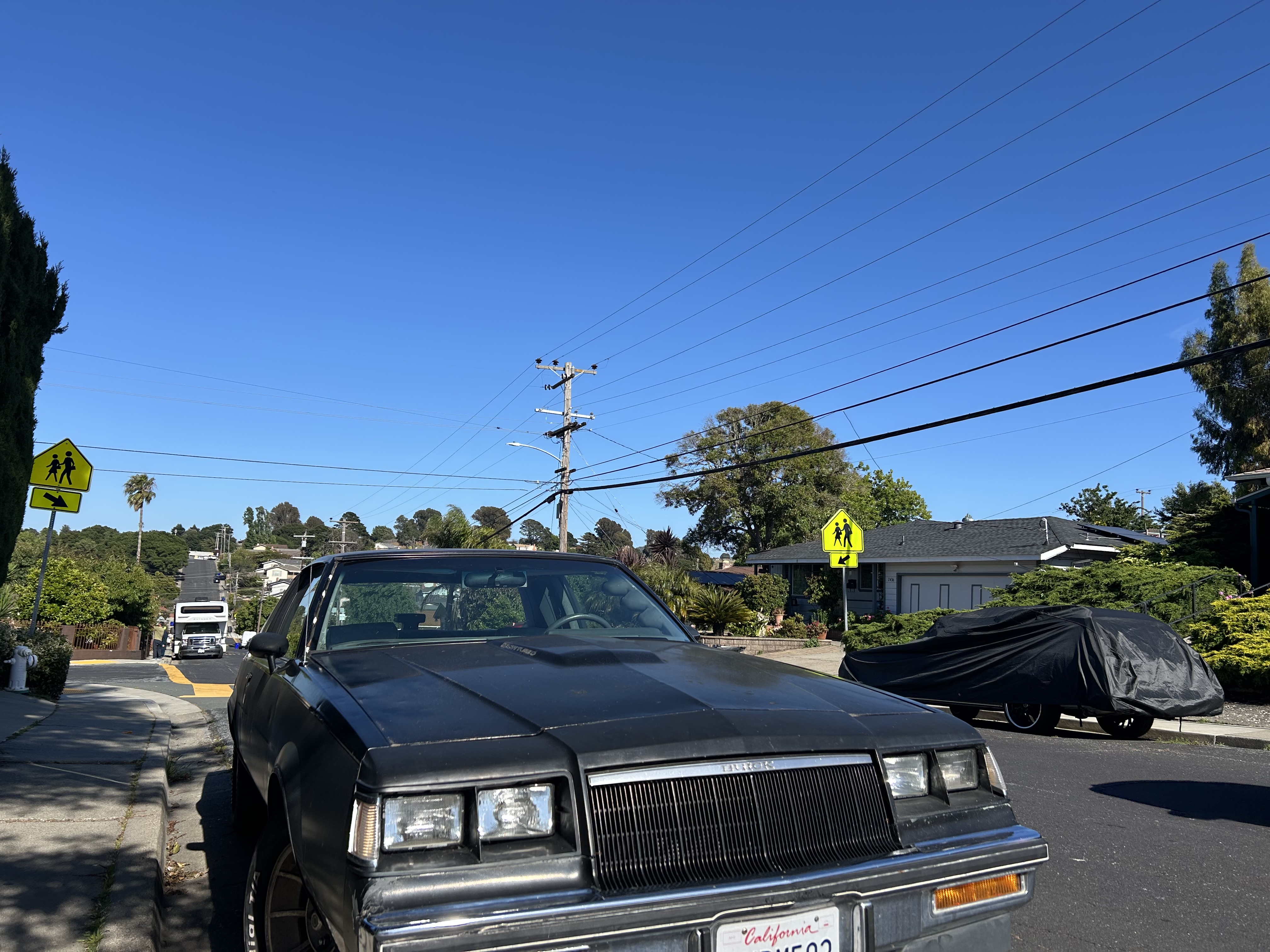 1987 Buick Grand National — front — California plates — second unit covered in background