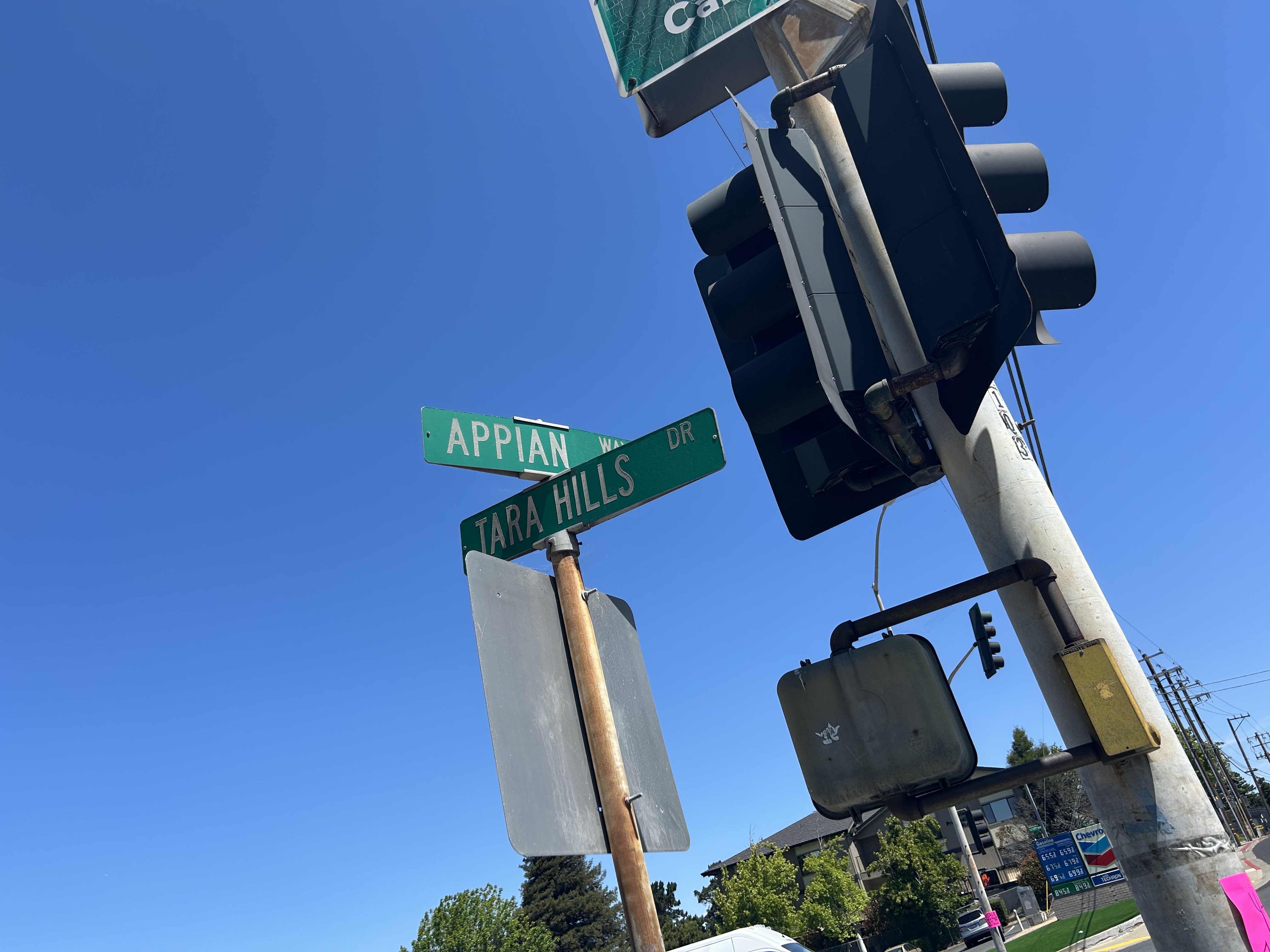 APPIAN WAY and TARA HILLS DR street sign intersection — blue California sky — Chevron visible in background — El Sobrante East Bay 925